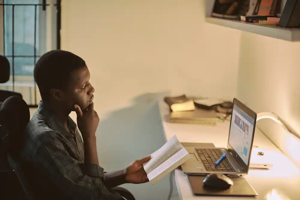 Young African professional learning and planning a digital skills career