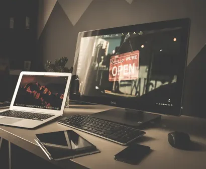 Laptop displaying a website portfolio in a freelance workspace