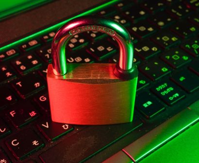 Laptop displaying a cybersecurity lock for WordPress website protection